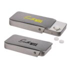 Two silver, rectangular metal pill crushers with the brand name Earthwise written on the top. The upper crusher shows a crushed pill, while the lower one is closed. Both feature a sliding mechanism.