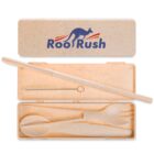 A beige eco-friendly cutlery set in a case with Roo Rush logo. Includes a fork, spoon, straw, and cleaning brush. Made from a sustainable material.