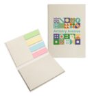 A beige notebook with Artistry Avenue and colorful geometric designs on the cover. Open to reveal pastel sticky notes in green, yellow, pink, and blue. The notebook and sticky notes are set against a white background.
