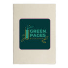 A notebook with a textured beige cover and a central dark green square logo. The logo reads Green Pages Bookshop with a stylized book and leaves design.