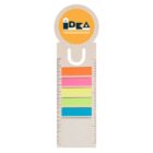 A bookmark with a semi-circular top featuring an advertising agency logo. Below, there are multicolored sticky notes in orange, pink, yellow, green, and blue, accompanied by a ruler on each side.