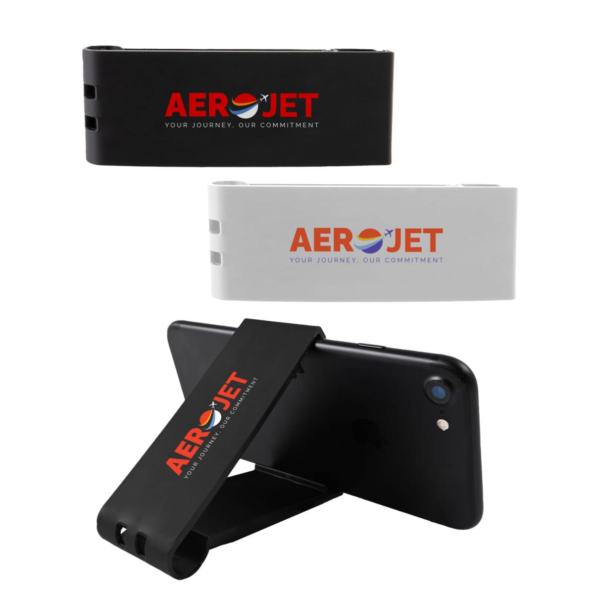 Two phone stands featuring the AeroJet logo, one in black and the other in white. The black stand is shown supporting a smartphone at an angle. The stands include the tagline Your Journey, Our Commitment.
