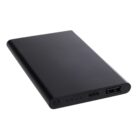 A slim, black portable power bank with a USB port, micro USB port, and a power button on its side. The design is minimalistic with a smooth finish.