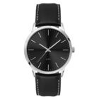 A sleek wristwatch with a black face, silver hour markers and hands, a black leather strap with white stitching, and a silver rim. The watch features classic minimalist design and quartz movement.