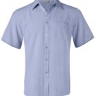 A light blue short-sleeve button-up shirt with a classic collar, featuring a single breast pocket on the left side. The shirt appears to be made of a lightweight fabric.