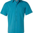 A teal short-sleeve button-up shirt with a classic collar, neatly arranged on a plain background. The shirt features a straight hem and visible seam detailing across the chest.