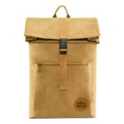 A tan, roll-top backpack with a front zip pocket, black buckle closure, and a patch with the text Rockside. The backpack has a small handle at the top.