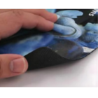 Peeling a blue Promotional Scrunchy Mouse Mat on white, showing its textured underside.