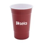 A red plastic tumbler with the word sela printed in white and a geometric logo above it. The cup is against a plain white background.