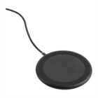 A black wireless charging pad with a thin attached cable on a white background. The circular pad has a smooth, minimalist design.
