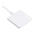 A white, square wireless charging pad with rounded edges, connected by a cable at one corner, on a plain white background.