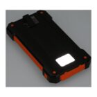 A rugged black and orange portable power bank with a built-in white LED light is shown on a white background.