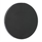 A round, black, flat object, possibly a coaster or lid, on a plain white background.