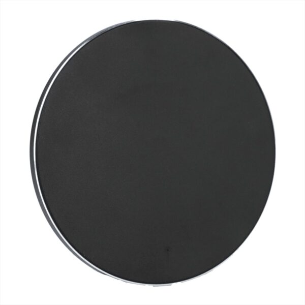 A round, black, flat object with a smooth surface, against a white background.