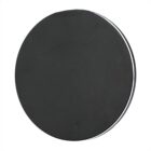 A round, black, flat object with a smooth surface, resembling a sleek disc. The background is plain white, making the disc prominent.