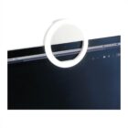 A circular ring light attached to the top edge of a computer screen. The screen displays a web browser with multiple tabs open on a white background. The ring light is white and positioned to provide illumination for video calls.