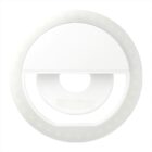 A white clip-on circular selfie ring light with an open center and a round LED light border. The design is minimalistic, made for enhancing lighting during photography or video calls.