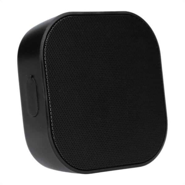 A compact, black rectangular speaker with rounded edges and a textured front grille. The speaker has a smooth, matte finish and a small button visible on the side.