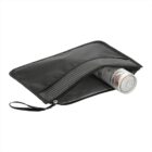 A black, zippered pouch is slightly open, revealing a white can with a patterned design inside. The pouch has a checkered interior lining and a wrist strap on the zipper pull.