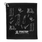 Black towel with white line drawings featuring golf clubs, golf balls, golf carts, a golfer swinging, and a golf bag. Text at the bottom reads Pinetop Country Club.