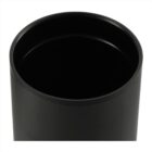 Close-up of a black cylindrical mug filled with a dark liquid. The mug has a smooth, matte finish and the liquid reaches near the rim. The background is plain white.