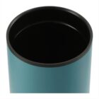 A close-up of an empty, teal-colored cylindrical container with a black interior. The top edge is smooth, and the photo focuses on the open end of the container.
