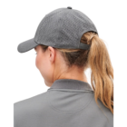 Person in a gray Sport Cap with a ponytail, seen from behind.