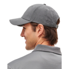 Person wearing a Sport Cap in gray with perforated back, looking to the side.