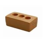 A brown rectangular brick with three round holes on the top surface, placed against a plain white background.