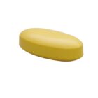 A yellow, oval-shaped soap bar with a smooth surface, isolated on a white background.