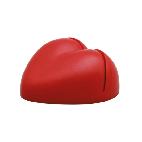 Red, heart-shaped knife block with two slots, designed to hold and protect knife blades. The smooth surface and vibrant color make it both functional and decorative for kitchen use.