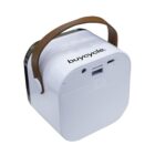 A small, white speaker with a brown handle, featuring the brand name buycycle on the front. The design is compact and minimalist, with visible buttons and ports on the top.