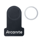 A black magnetic phone holder with Arcanite written in white. Next to it is a silver metal ring. The holder has a circular top and a rectangular base.