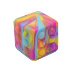 A multicolored, hexagonal fidget toy cube with a pattern of bubbles. The vibrant colors include blue, yellow, pink, and orange, creating a flowing tie-dye effect on the surface.