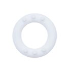 A white, circular, flat object with several evenly spaced protrusions on its surface, resembling buttons, against a plain white background.