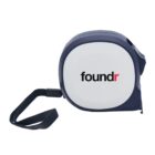A navy and white tape measure with a black wrist strap. The word foundr is printed on the white side.