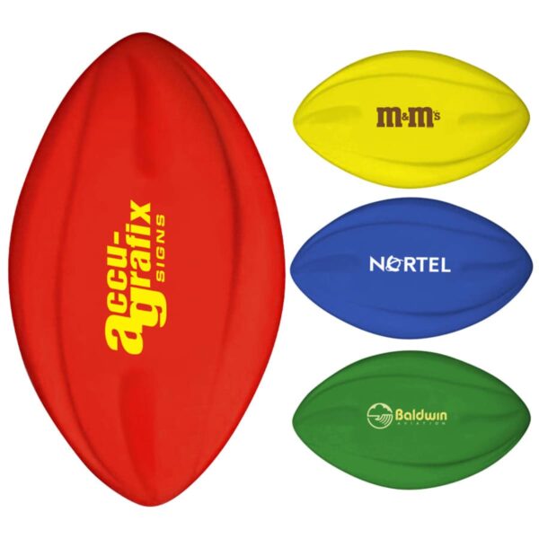 Four foam rugby balls in different colors: a red ball with accu-grafix in yellow, a yellow ball with M&Ms in brown, a blue ball with NORTEL in white, and a green ball with Baldwin in white.