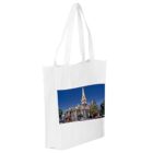 White tote bag with an image of a large, ornate church and blue sky on the front.