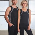 Two people wearing matching black and gray athletic tank tops stand side by side indoors.