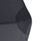 Close-up of a black umbrella canopy, showing the fabric texture and a metal rib underneath. The angle reveals a triangular section where the material is stitched together.