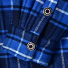 Close-up of a blue and black plaid flannel shirt cuff with white accents, featuring two button closures. The fabric has a soft, textured appearance.