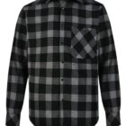 A long-sleeved, button-up shirt with a black and gray checkered pattern. It features a single chest pocket on the left side and a pointed collar.