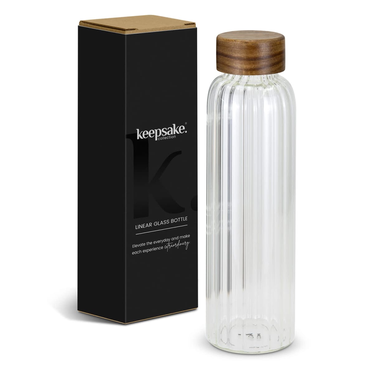 Clear ribbed glass bottle with a wooden lid next to a black box labeled keepsake.