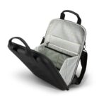 Open black laptop bag with gray interior lining and small yellow star pattern.