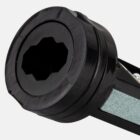 Close-up of a black plastic tool with a hexagonal opening at one end.