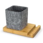 Gray felt square pot on a wooden bamboo tray with a slot on the right side.