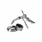Metal corkscrew wine opener and a round wine bottle collar on a white background.