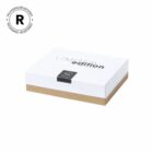 A white and brown box labeled Limited edition with a registered packaging symbol.