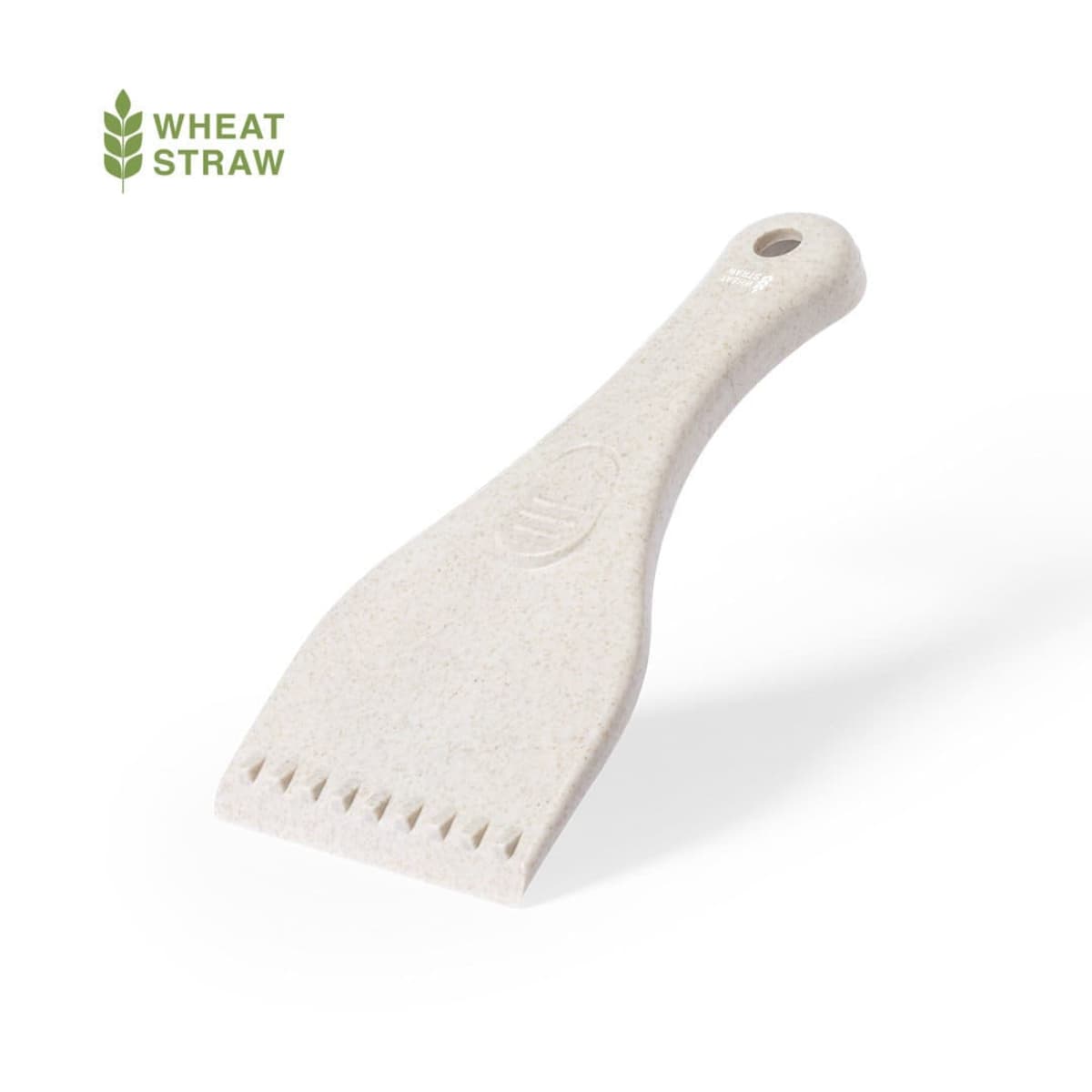 Beige wheat straw ice scraper with a hole in the handle, laying on a white background.