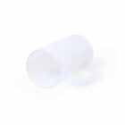 A frosted glass mug lying on its side against a white background.
